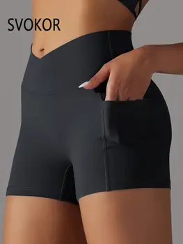 Спортивные шорты SVOKOR с перекрестной V-образной талией, женские бесшовные велосипедные шорты для фитнеса, обтягивающие с карманами, сексуальные спортивные штаны для подтяжки ягодиц, хруст для фитнеса